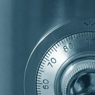 A close up of the dial on a combination lock