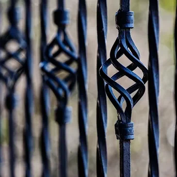 A close up of the iron fence