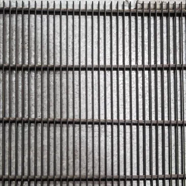 A close up of the grill surface of an oven.