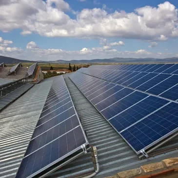 A large solar panel on the roof of a building.