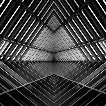 A black and white photo of an empty room.