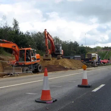 A road with construction equipment on it.