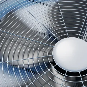 A close up of the blades on an air conditioner